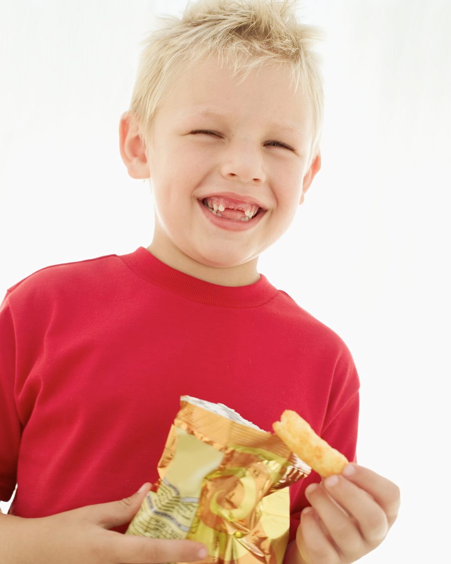 Student enjoying a better-for-you snack from On The Go Markets
